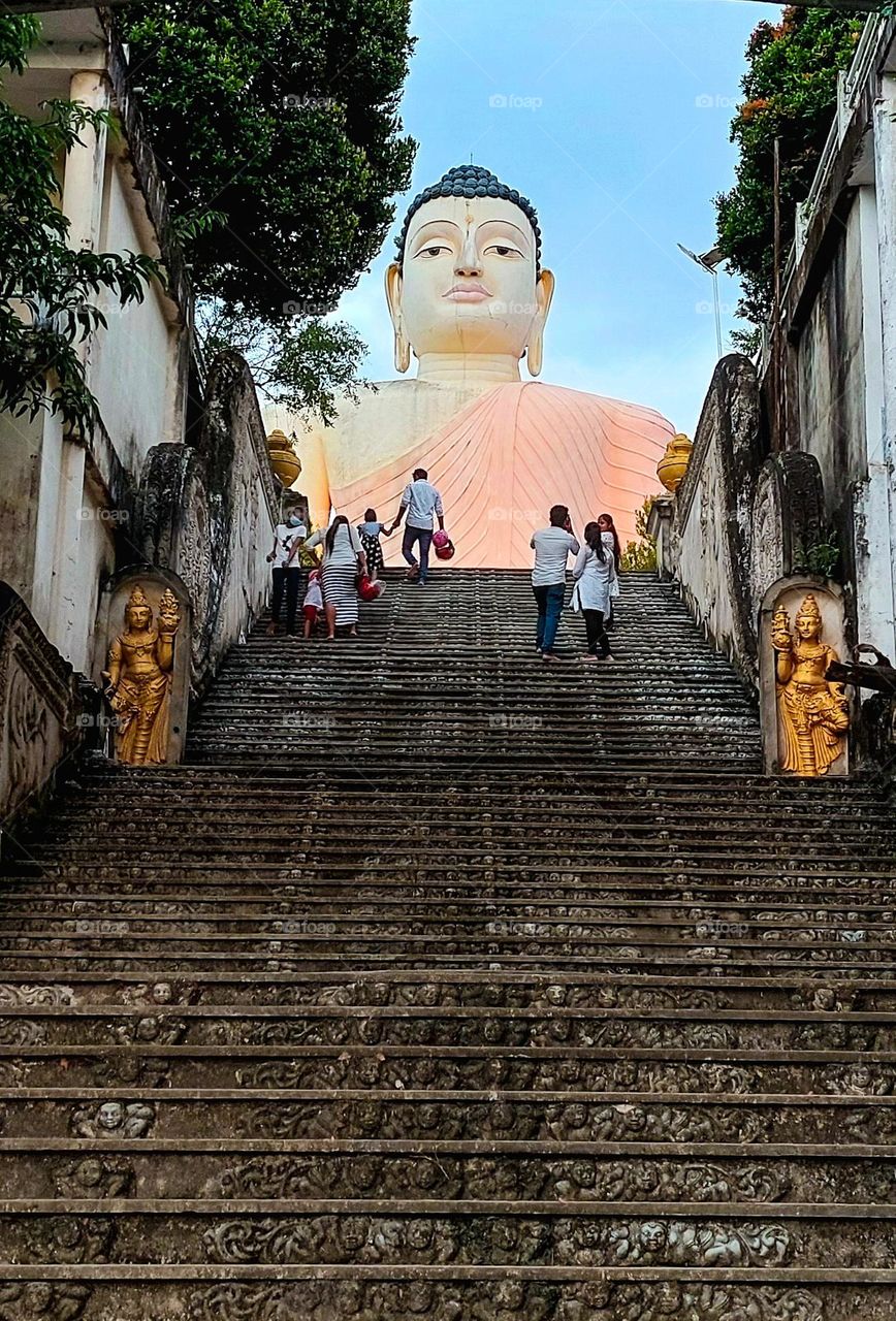 Ascending to Enlightenment: The Journey to Kande Wiharaya's Buddha Statue