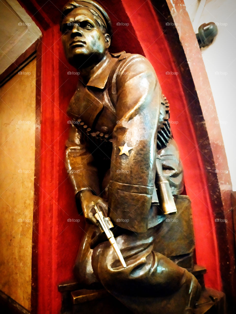 Moscow subway.  "Revolution square".  Sailor with a revolver