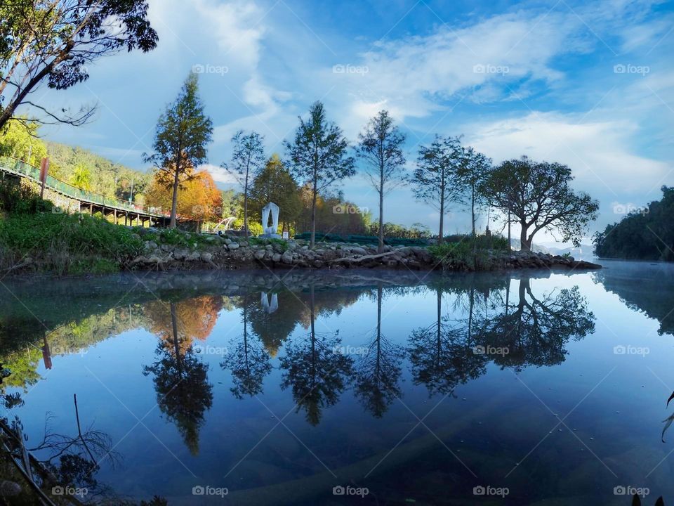 Beautiful lake scenery with blue sky white clouds
