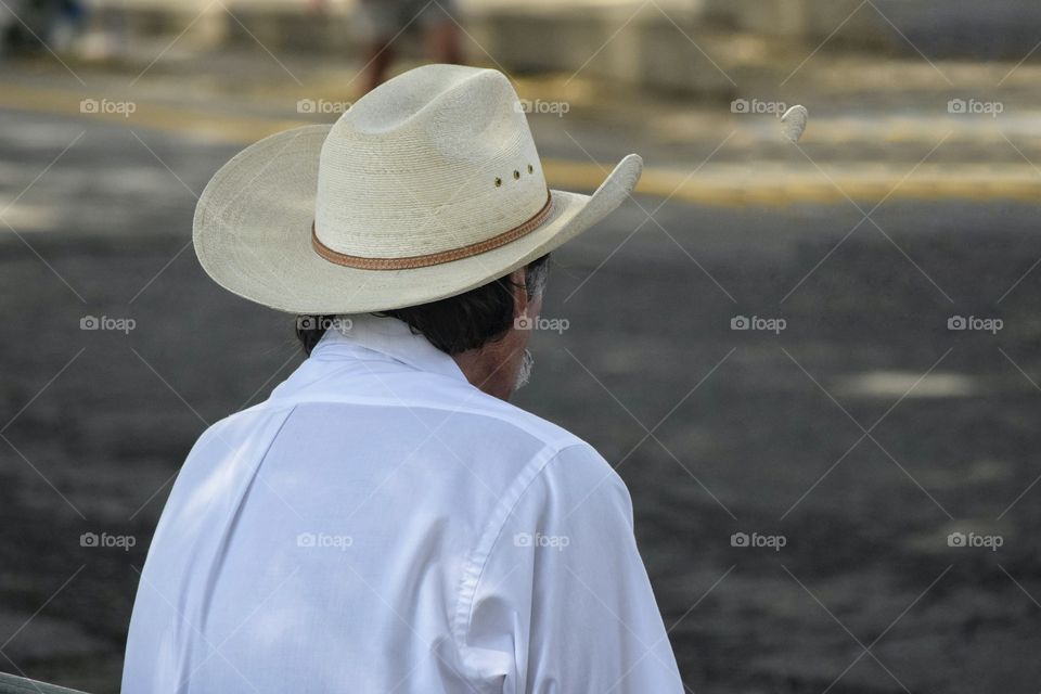 Man in White Hat