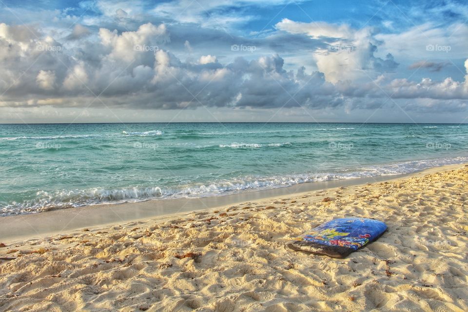 surf table under sand in the beach