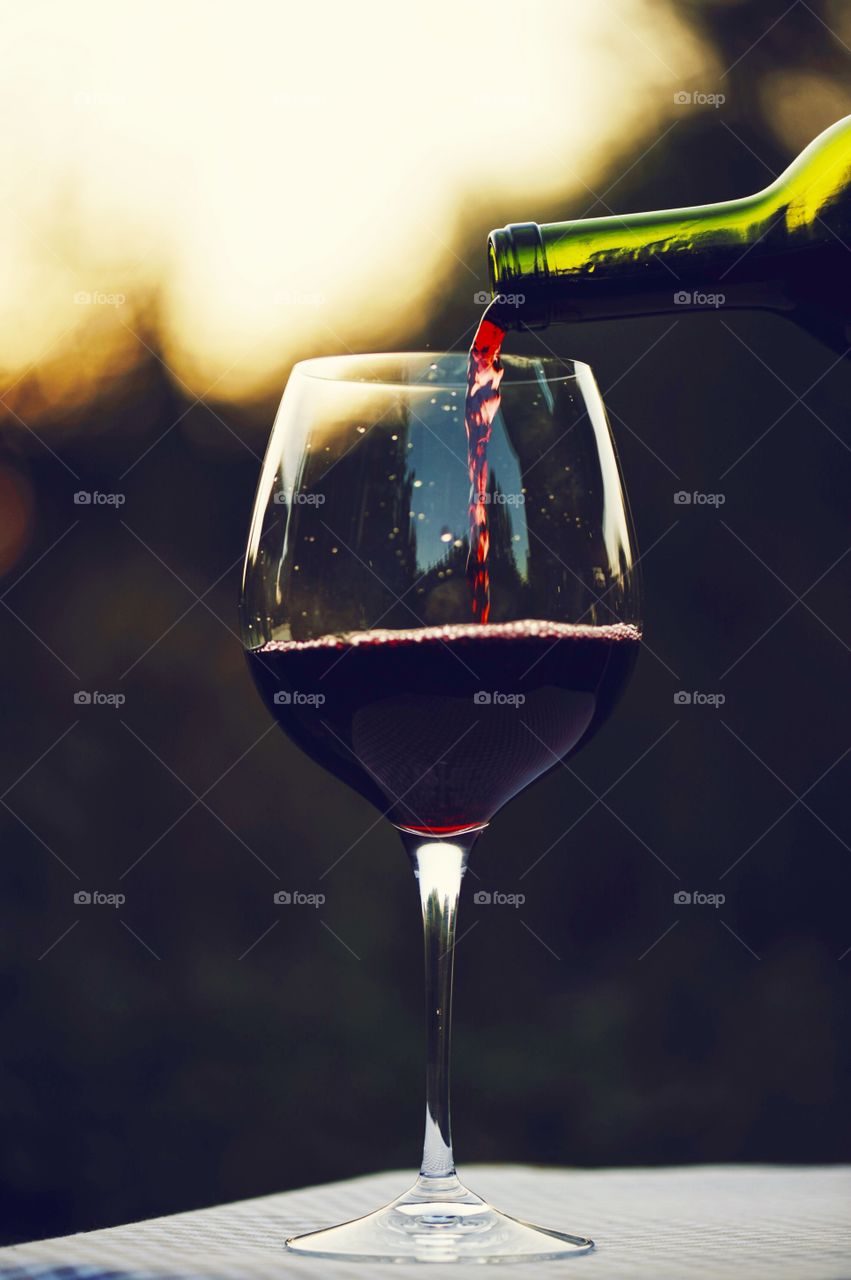 Close-up of wine bottle and wine glass