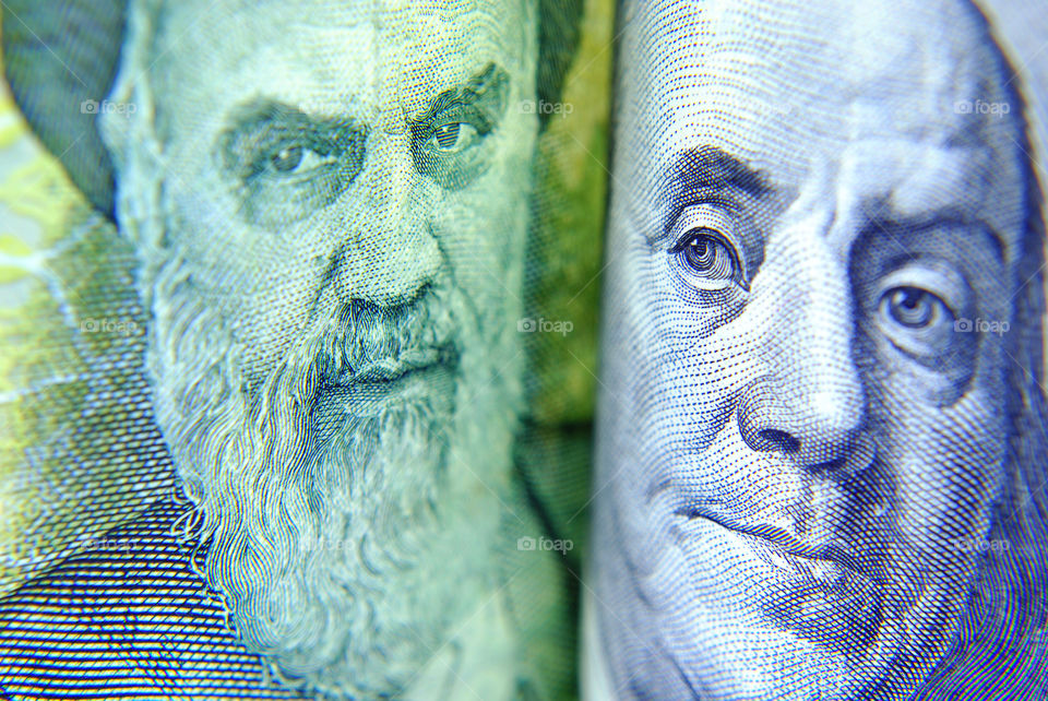 Iran and USA currency close up