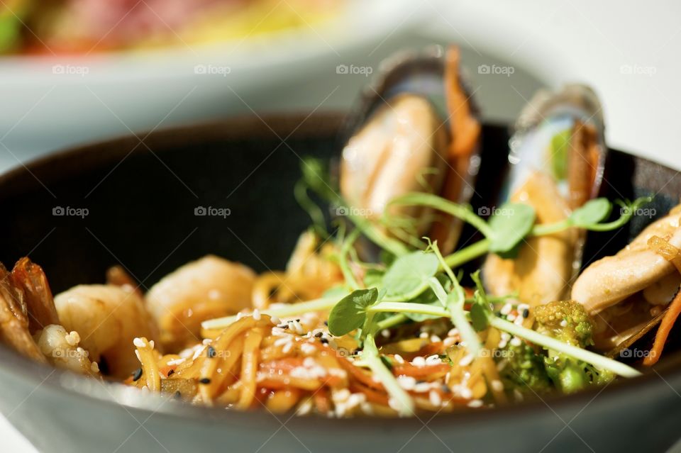 close-up of a plate with Asian cuisine