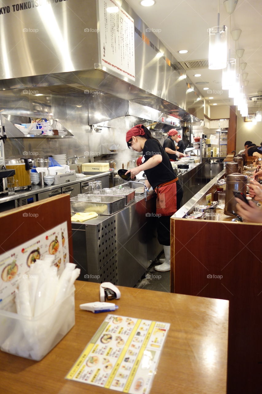 A busy day in Tokyo's ramen restaurant! You'd love the atmosphere!