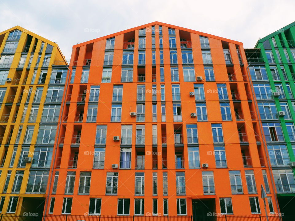 Orange facade of the building