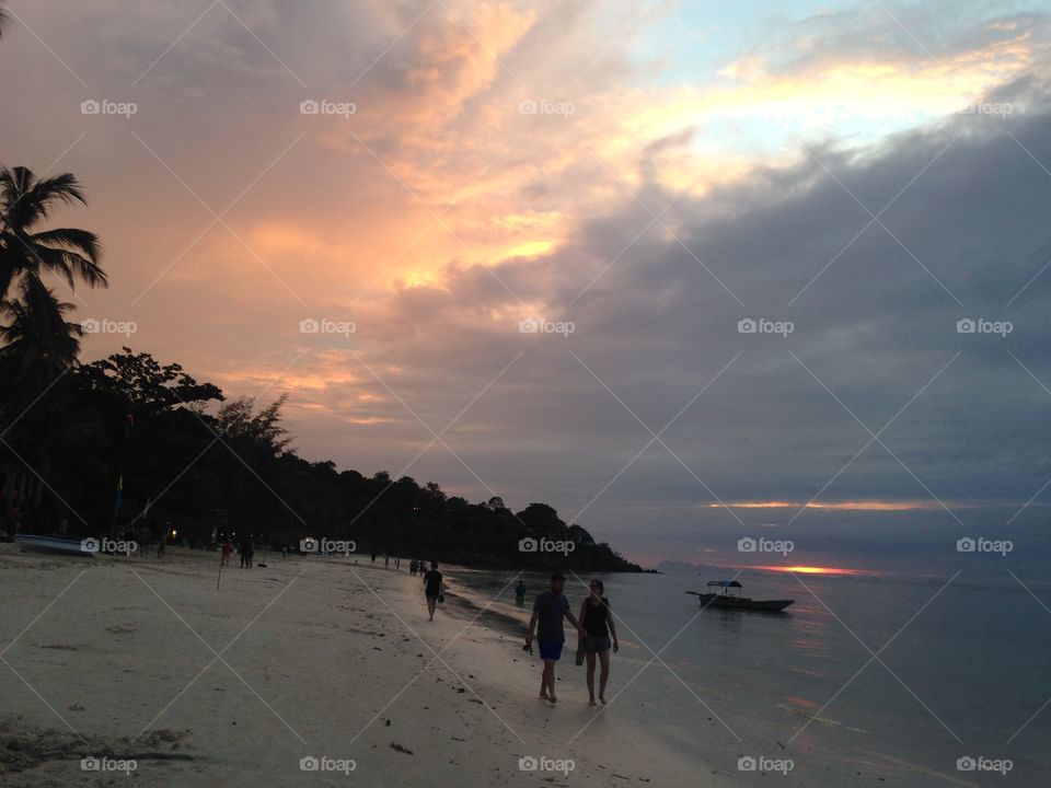 Sunset walks along the beach 
