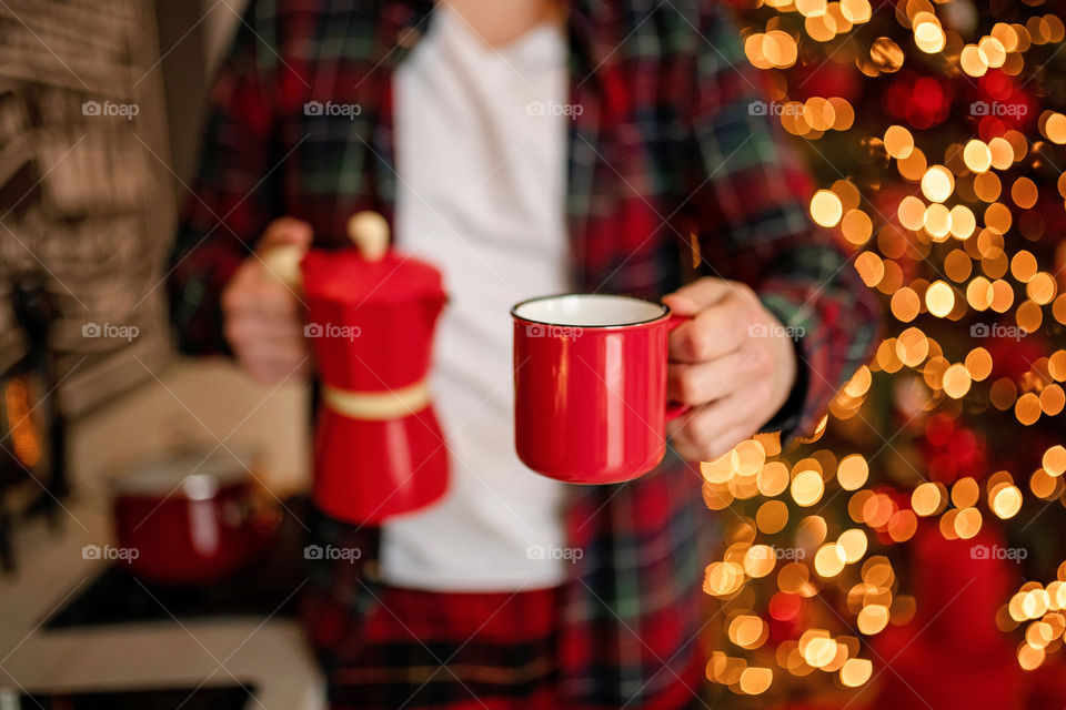 cup of coffee in a cozy festive Christmas atmosphere