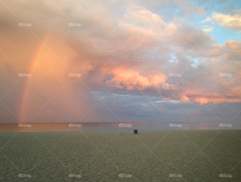 Sunset and the rainbow over the Baltic Sea in Poland Gdynia 