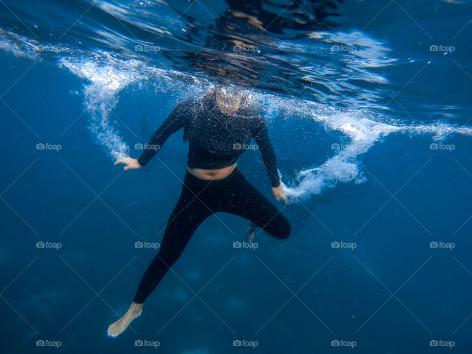 Dancing underwater.