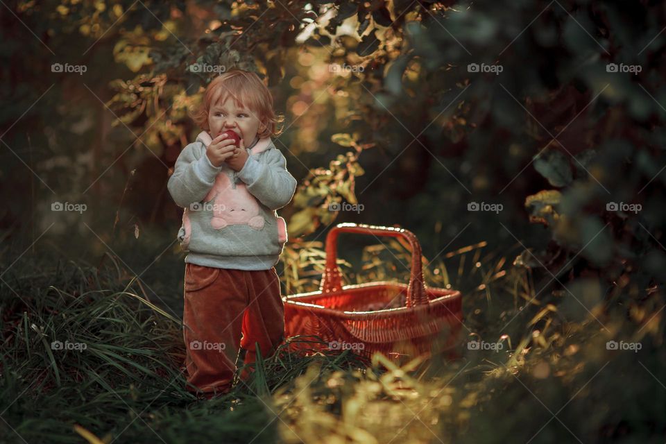 Little girl portrait with apple