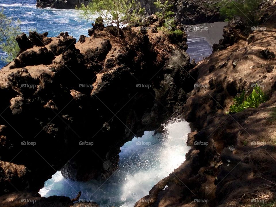 Sea arch and sea spray