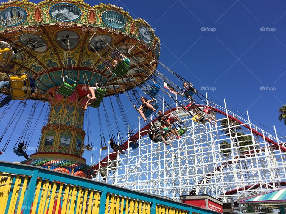 roller coasters and colors at the carnival