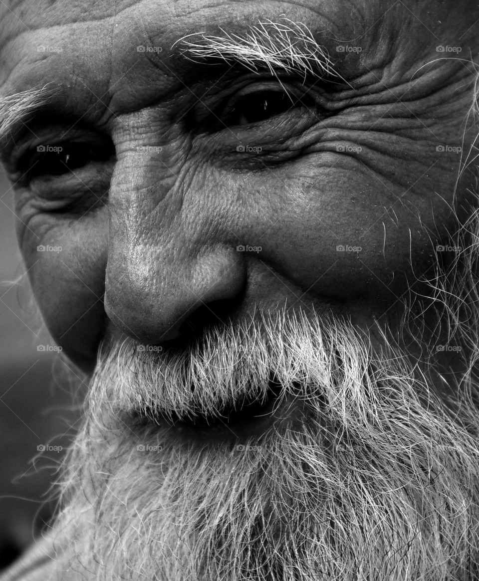 Close-up of senior man with gray beard