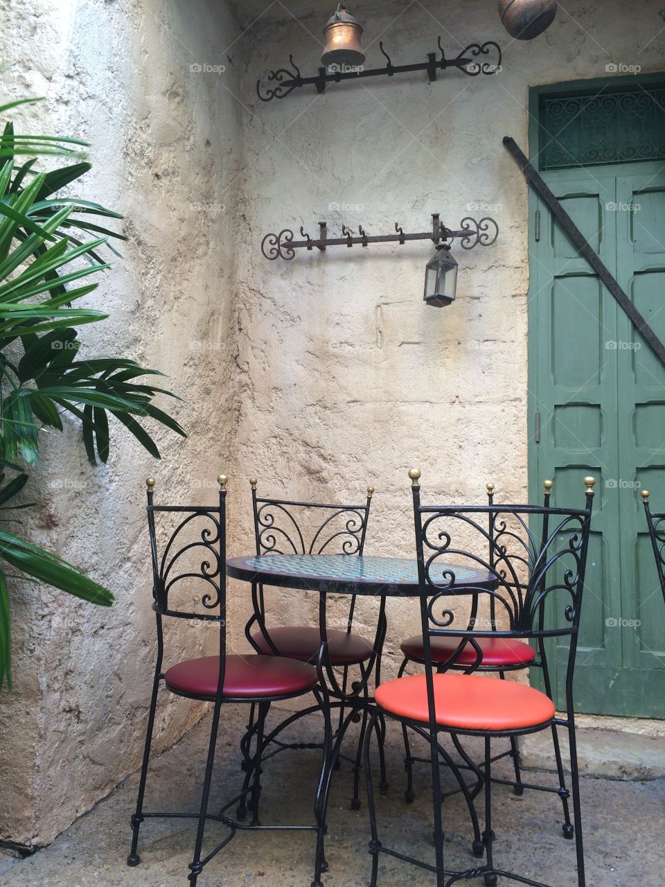 Intimate cafe  table with Moroccan theme.   