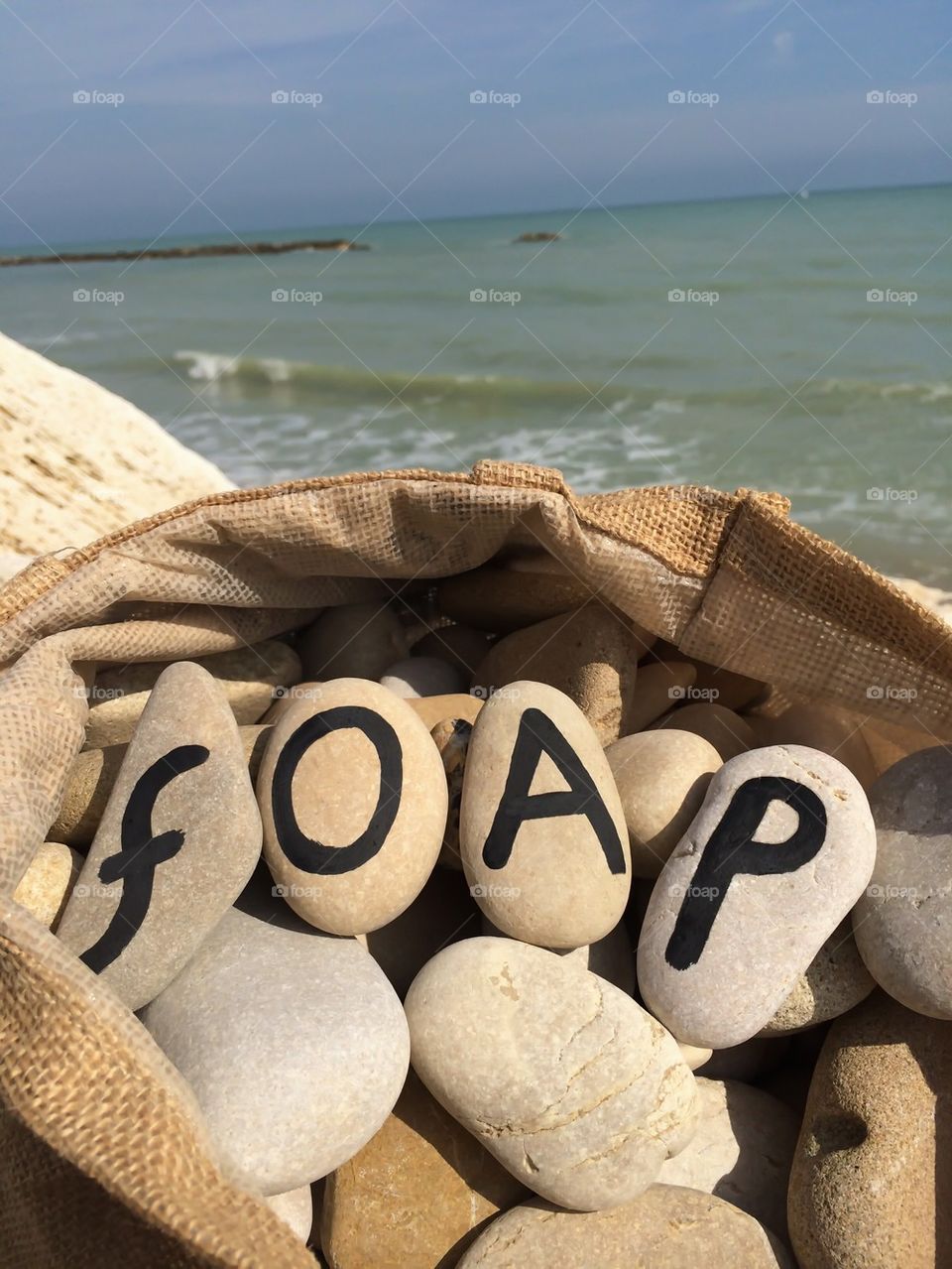 Foap word with many stones in a bag