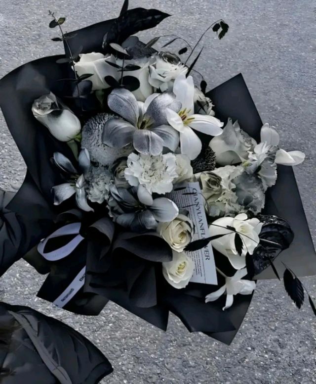 composition of flowers in white and black color