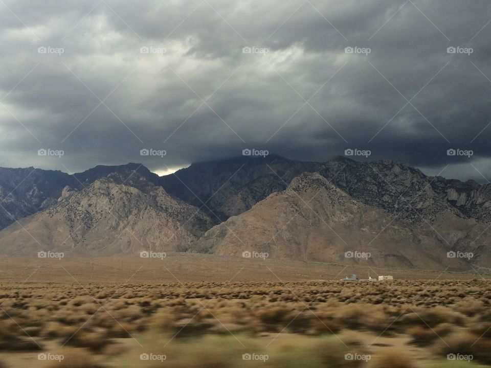 stormy mountain . road trip from reno to san diego saw a storm caught on the montain 