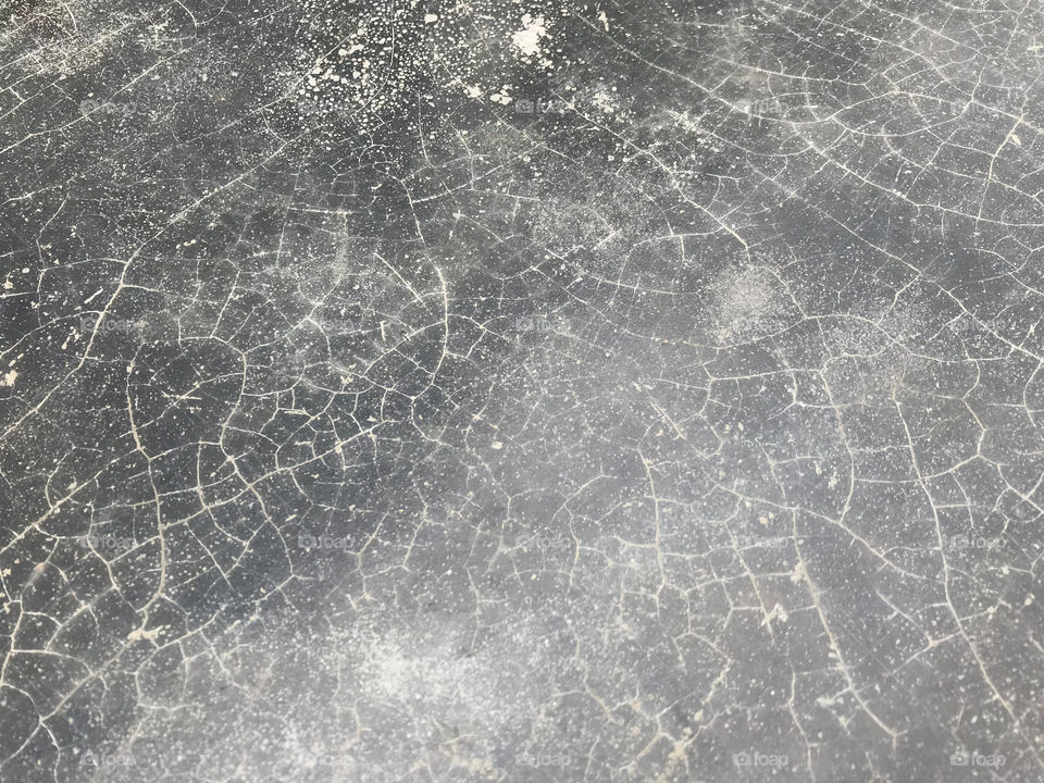 damaged grey cement floor with cracked and lines surface, using for background