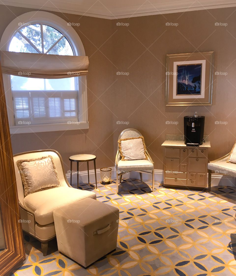 Simple but elegant interior decor.  Muted colors of cream and tan make for a soft, inviting room. 