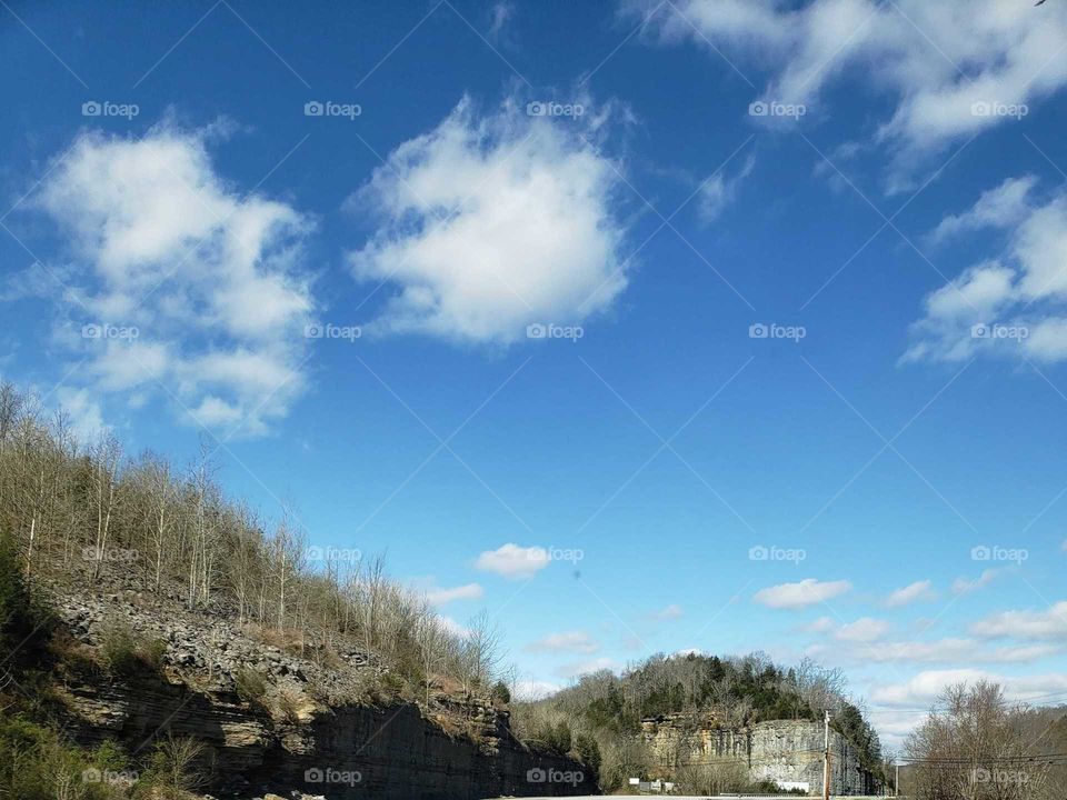 Mountain and blue sky with white clouds
