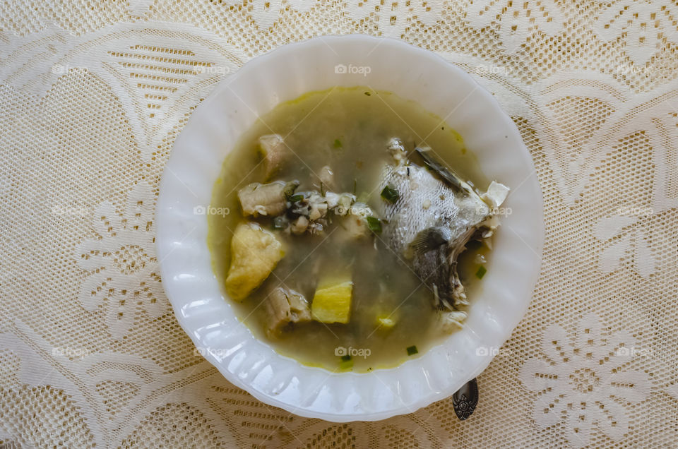 White Soup Dish Filled With Fish Broth