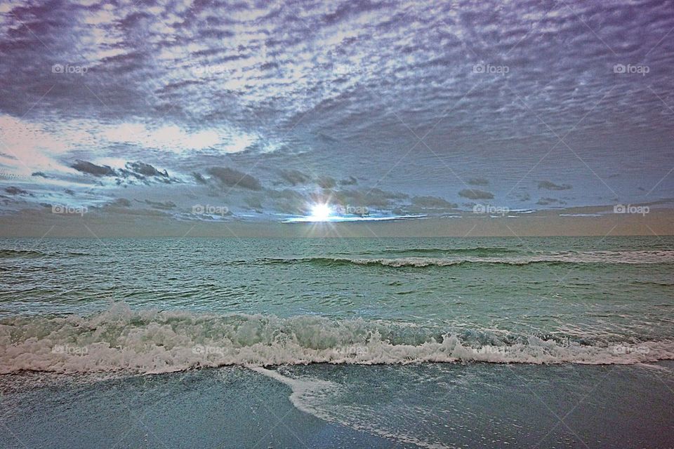 Sun over ocean