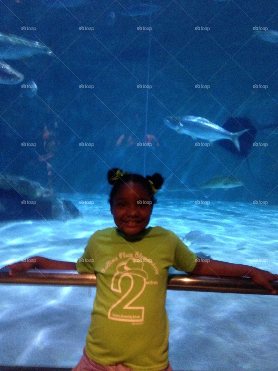 Aquarium. Daughter at the aquarium