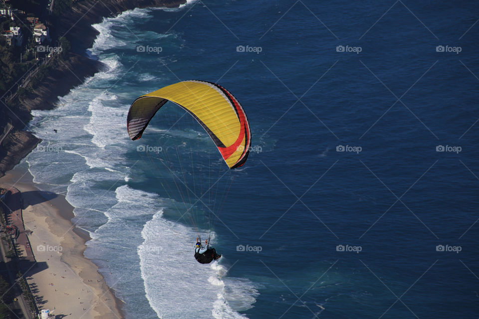 paraglider over the ocean