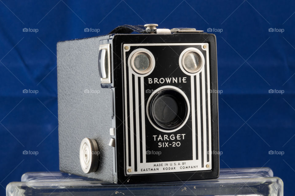 Kodak Brownie Target 620 from 1950's set on glass block and dark blue velvet background