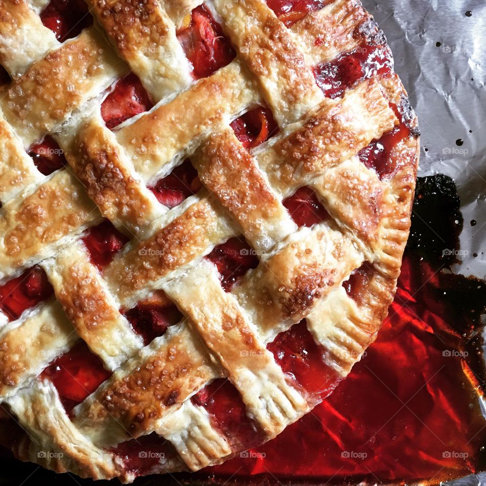 An overflowing fruit pie