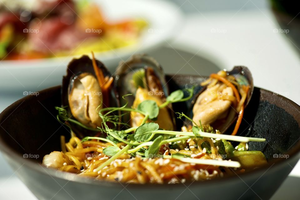 close-up of a plate with Asian cuisine