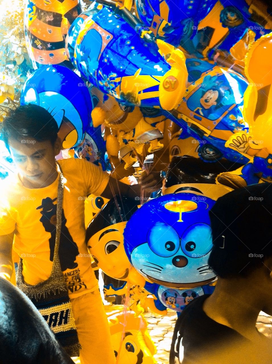 A man selling balloons