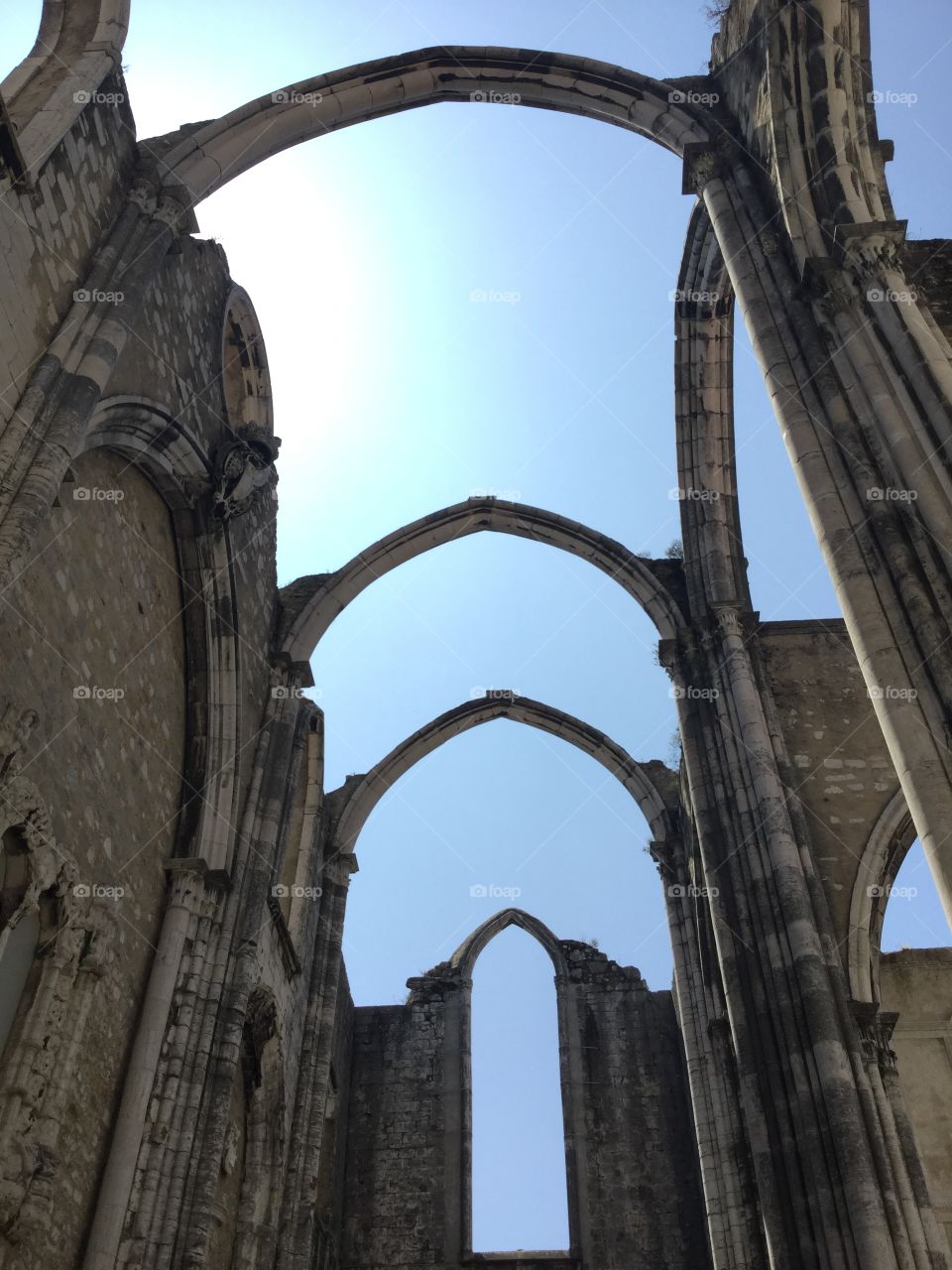 Church ruins, arches on blue sky, Lisbon, Portugal