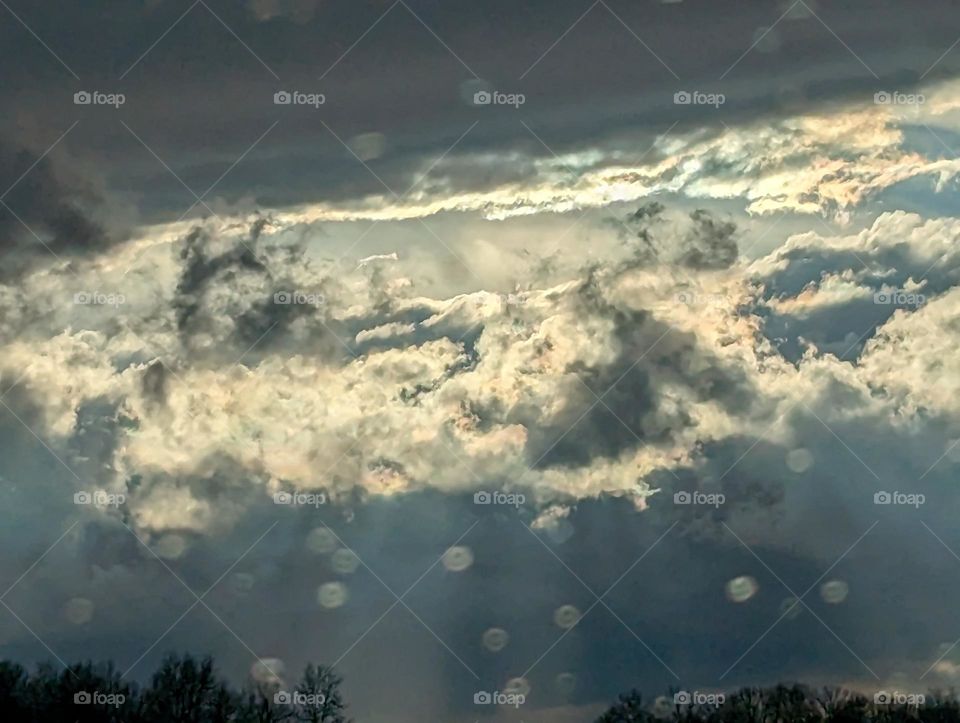 Rainy weather through my windshield.