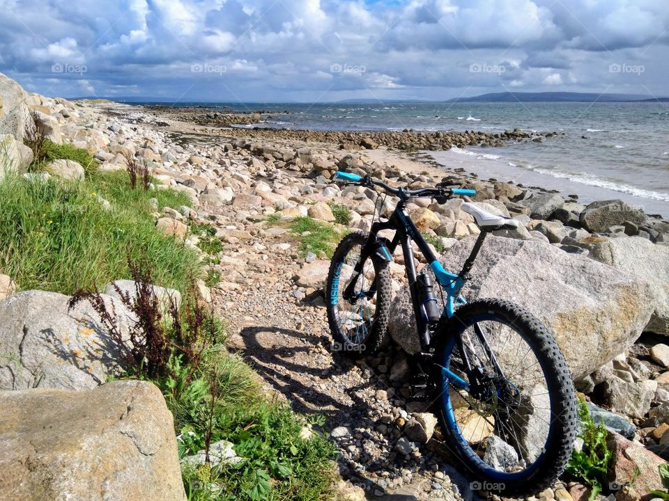 Mountain bike at rocky beach