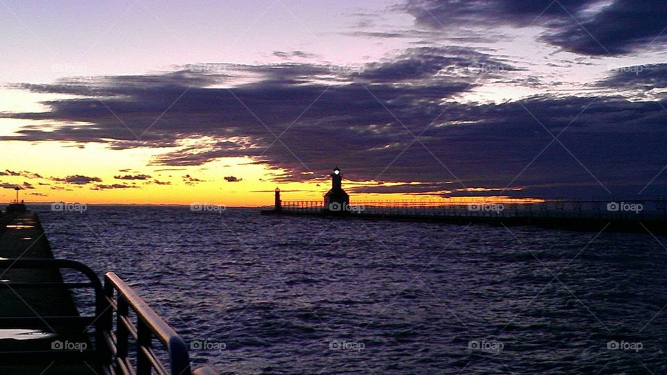 Lighthouse sunset. Silver beach st. joe