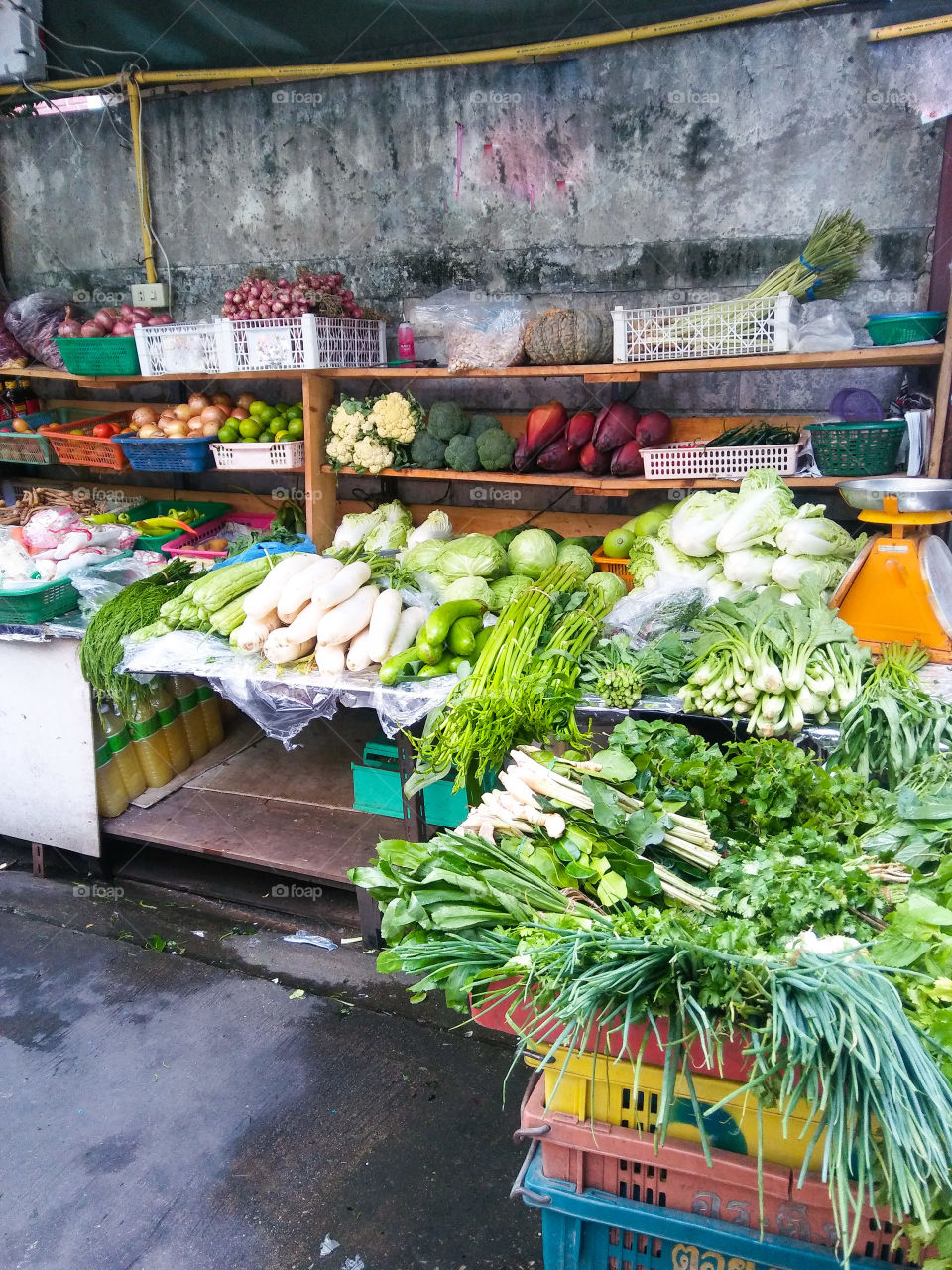 Tropical vegetables shop on street market Bangkok.