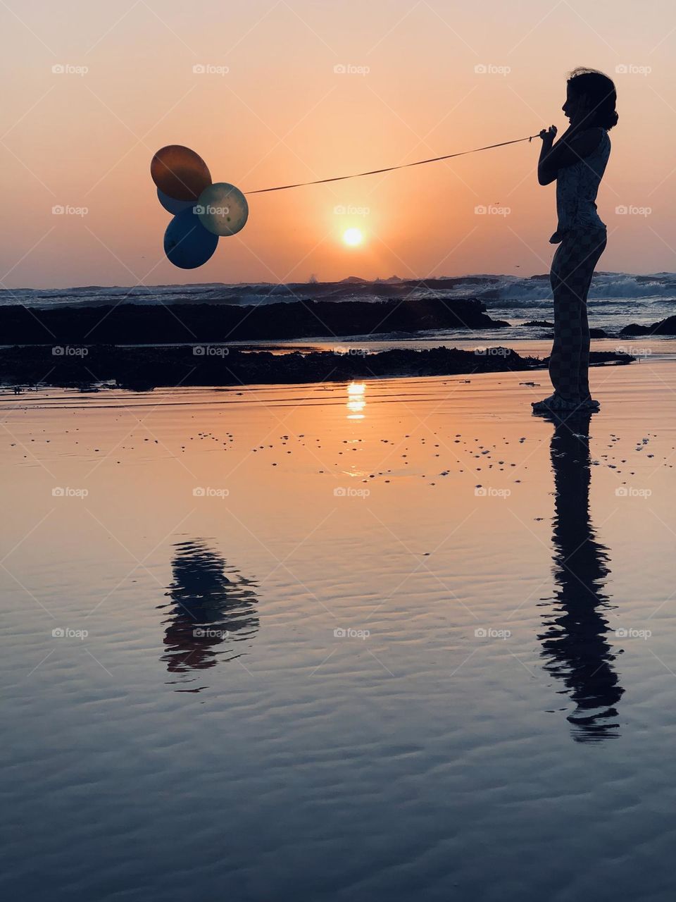 Beautiful balloons against splendid sunset at essaouira city in morocco.