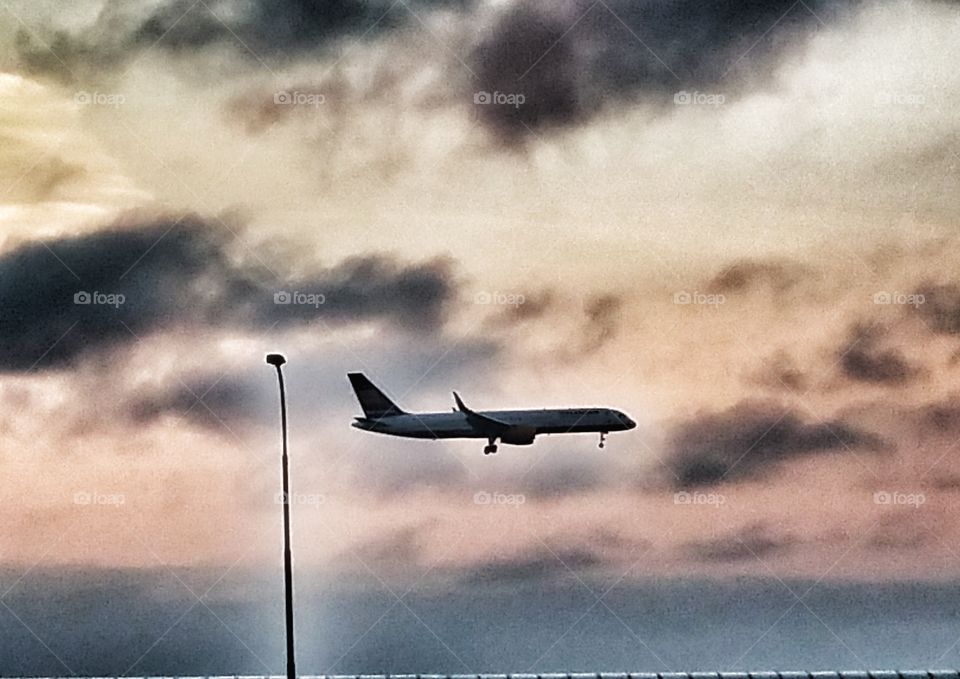 Airplane against Sunrise