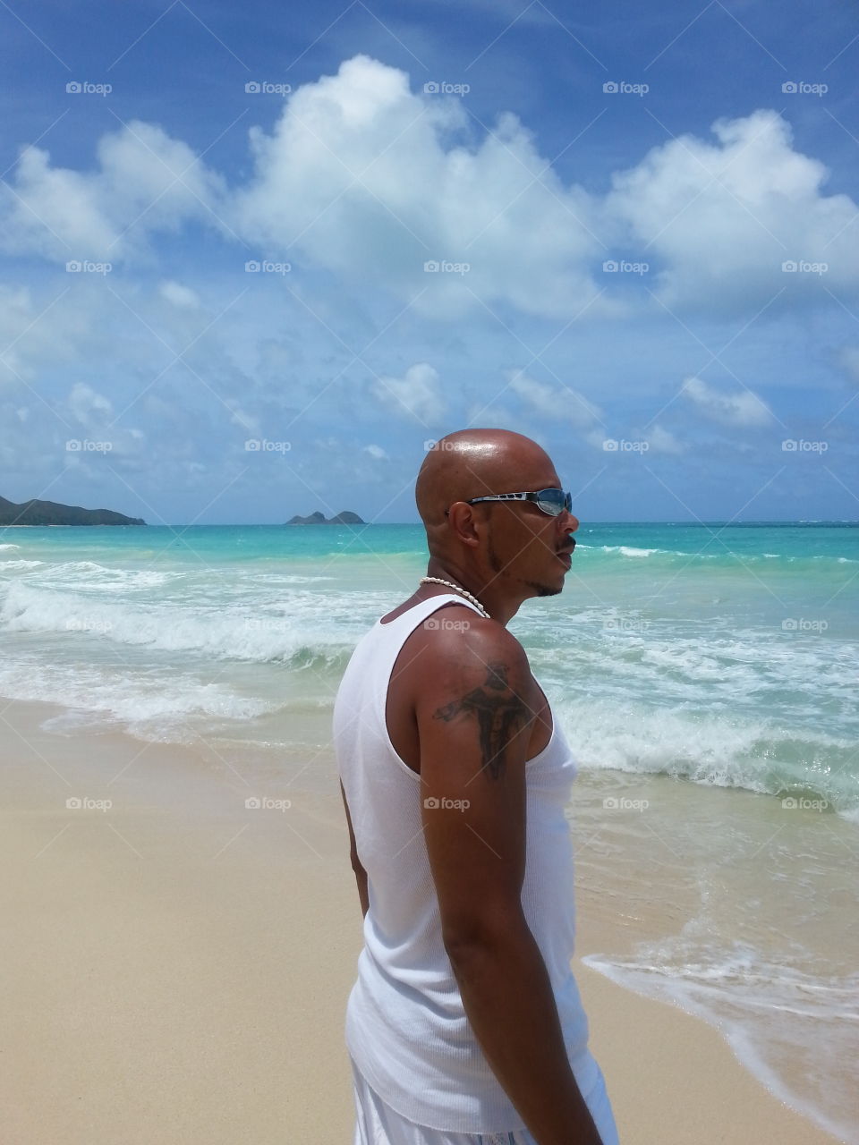 Tropical island beach getaway. Beach of Hawaii known for majestic wedding venues, pure Zen