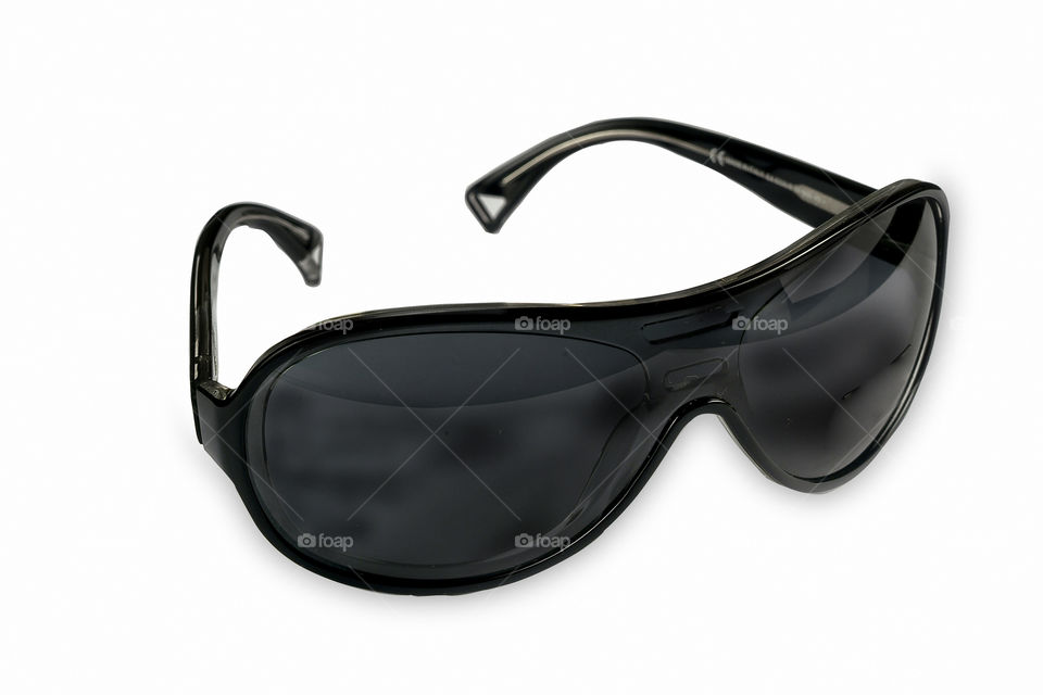 sporting dark glasses on white background