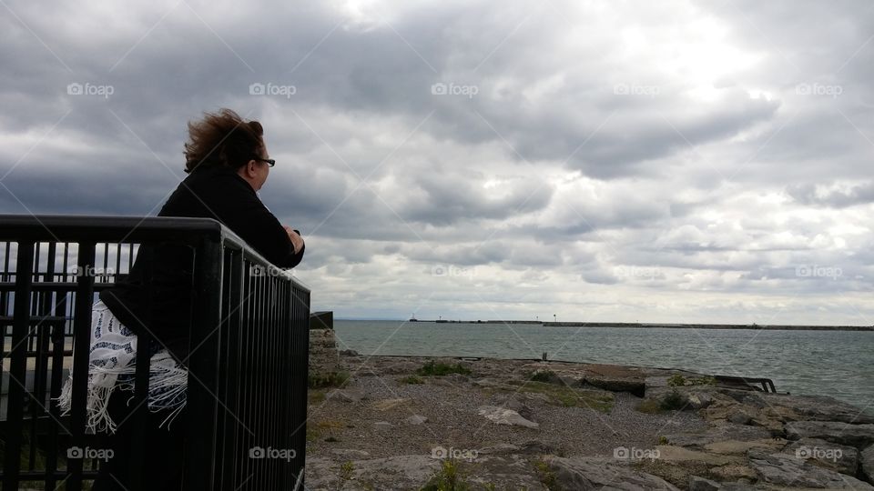 Lake Erie in NY with woman on pier