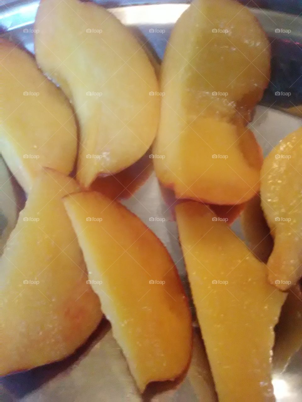 golden  peach slices soooo delicious and sweet .