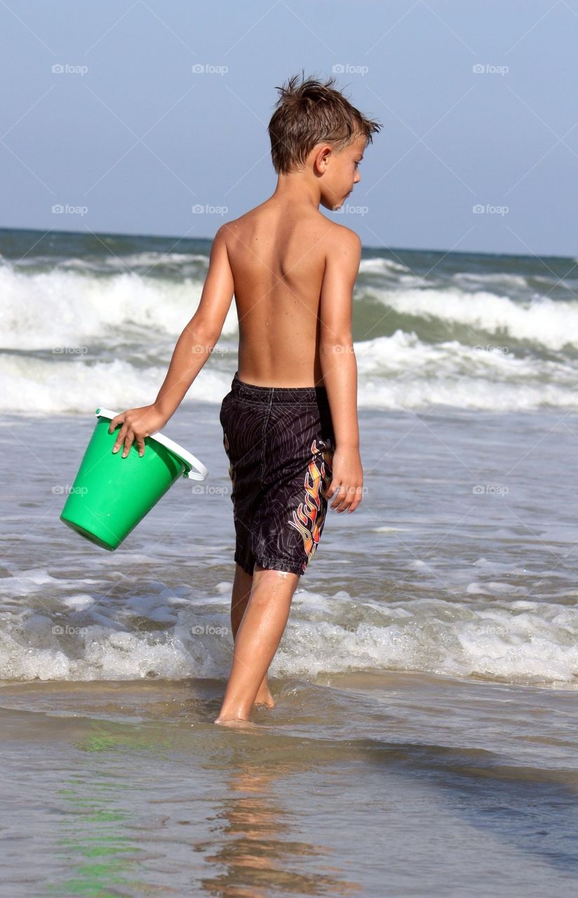 Boy with bucket