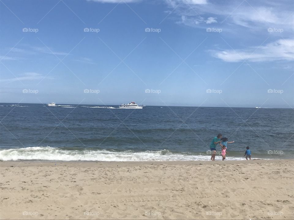 Boat on the ocean while on the beach 