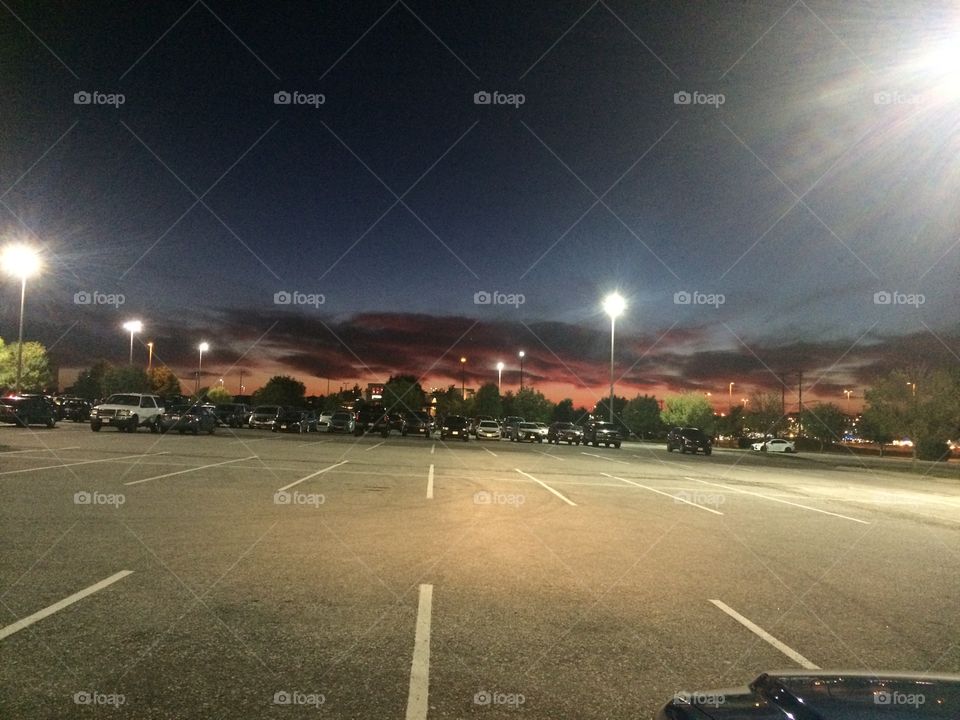 Empty parking lot with Sunset in the background 