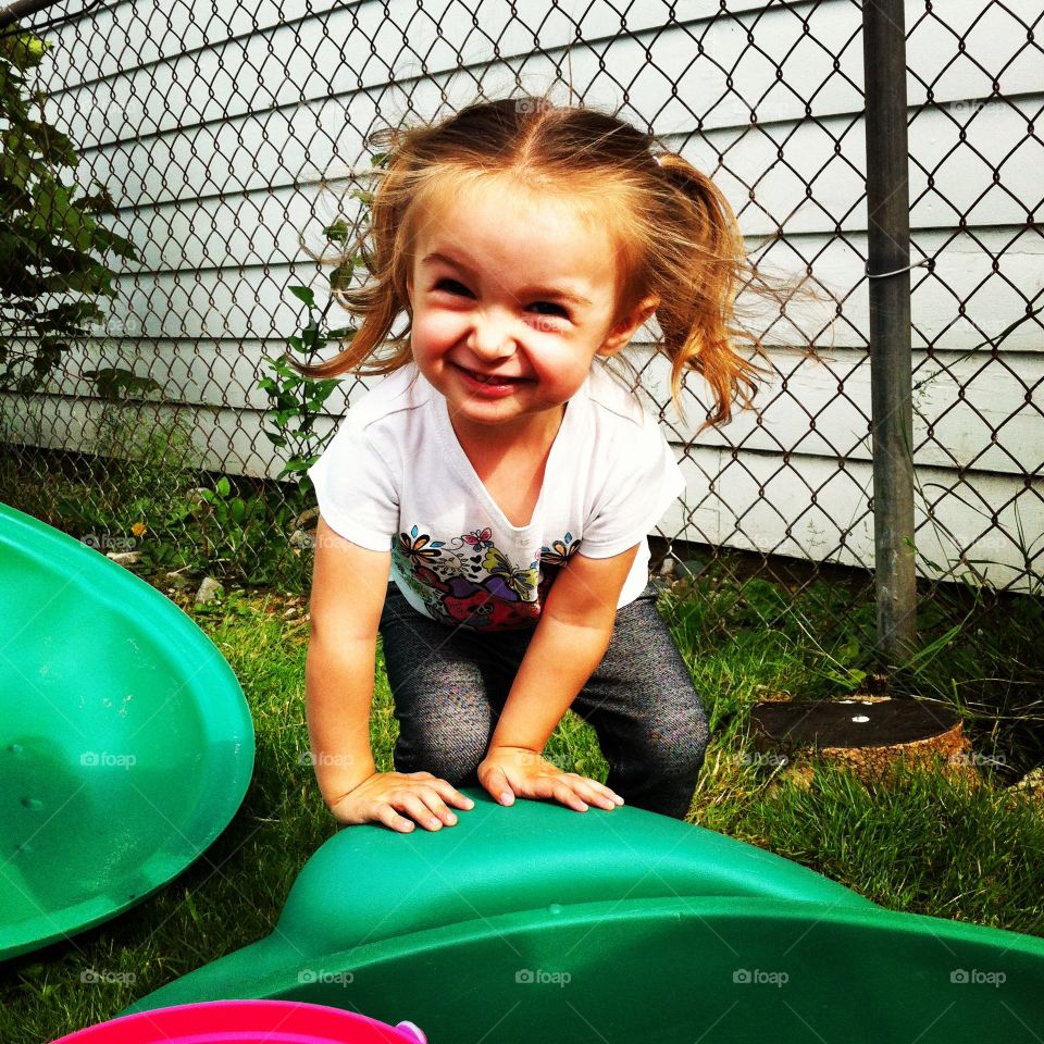 Bean playing. My daughter, playing outside. 