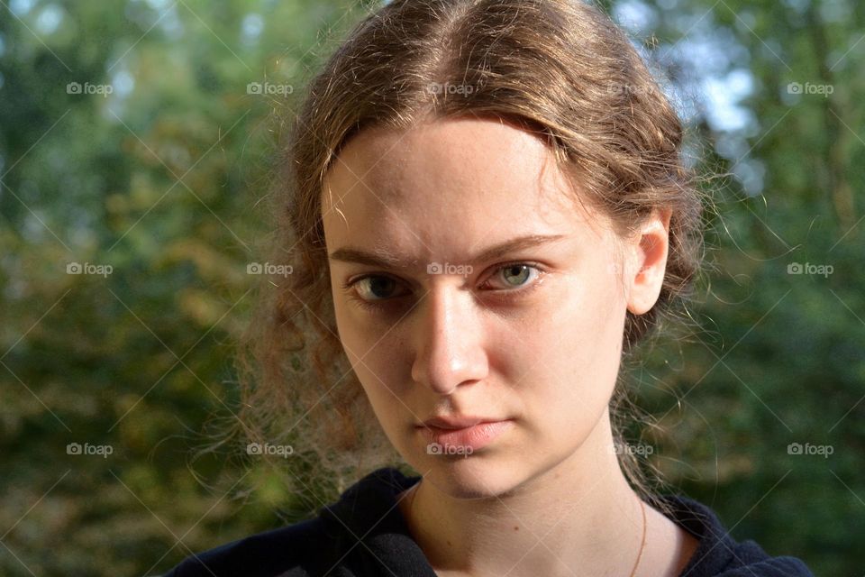 young girl beautiful portrait in sunlight