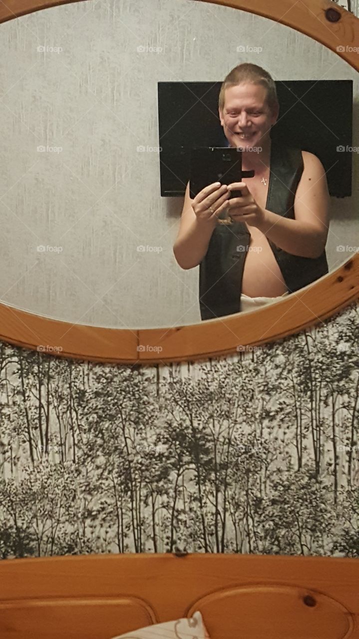 half naked man in the mirror